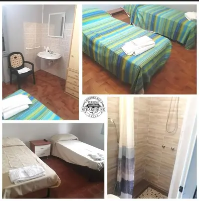 Letto o letti in una camera di Ristorante Turismo Steak house B&B
