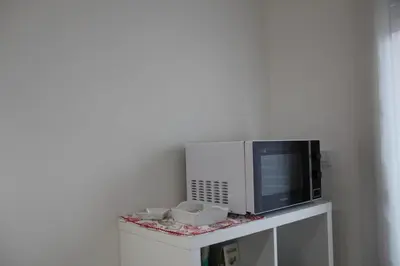TV o dispositivi per l'intrattenimento presso The Blue Nest - Red Apartment near 5 Terre
