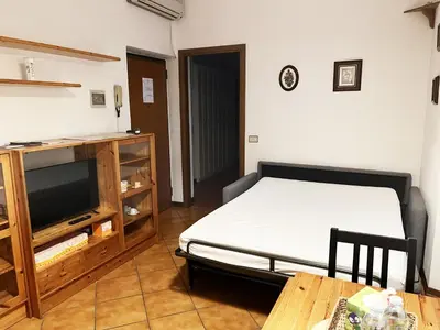 Letto o letti in una camera di La Casetta - tranquillo in pieno centro - con garage