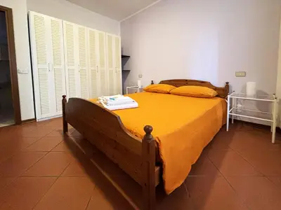 Letto o letti in una camera di La Casetta - tranquillo in pieno centro - con garage