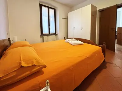 Letto o letti in una camera di La Casetta - tranquillo in pieno centro - con garage