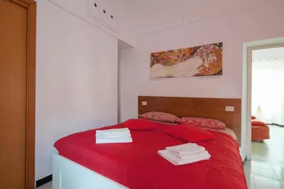 Letto o letti in una camera di Beatrice Nel centro di Levanto