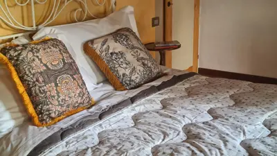 Letto o letti in una camera di La Maison Deux