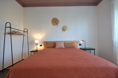 Letto o letti in una camera di Cosy Home Riviera Wi-fi, AC, terrace 3 BDR