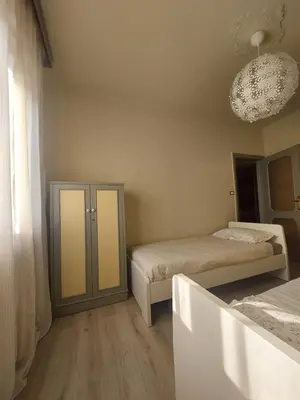 Letto o letti in una camera di La Chicca