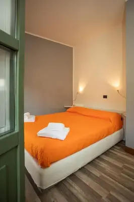 Letto o letti in una camera di Appartamento Roma 55