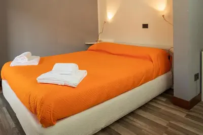 Letto o letti in una camera di Appartamento Roma 55