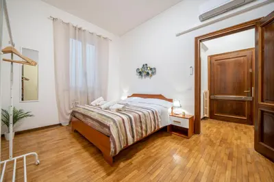 Letto o letti in una camera di [Ghirlandina]Favoloso appartamento in pieno centro