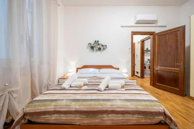Letto o letti in una camera di [Ghirlandina]Favoloso appartamento in pieno centro