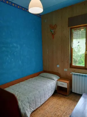 Letto o letti in una camera di Casa Dirindo