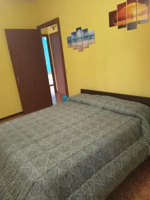 Letto o letti in una camera di Casa Dirindo