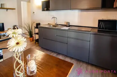 Cucina o angolo cottura di FuoriPorta Affitti Brevi - Corte 3 con parcheggio gratuito