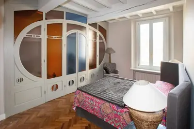 Letto o letti in una camera di Charme and relax in downtown Parma
