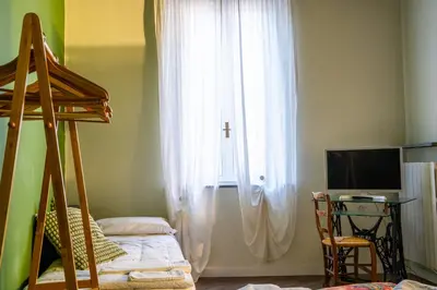 Letto o letti in una camera di L'eco della rosa