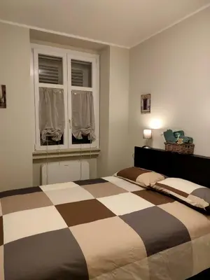 Letto o letti in una camera di Residenza Il principe, Bilocale 2 in centro