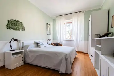 Letto o letti in una camera di ALMA Vacanza