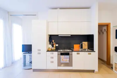 Cucina o angolo cottura di 113 - Casa Le Terrazze in centro 100 metri Mare Spiaggia, BOX AUTO GRATIS