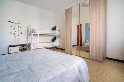 Letto o letti in una camera di New House La Spezia