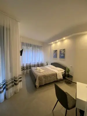 Letto o letti in una camera di Residenza Via Verdi