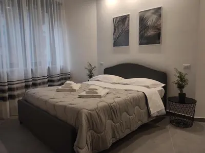 Letto o letti in una camera di Residenza Via Verdi