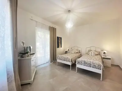Letto o letti in una camera di COMFORTABLE SEA HOLIDAYS AND WALKS