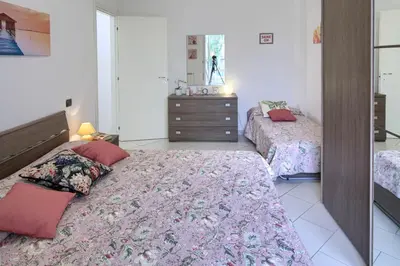 Letto o letti in una camera di Fernanda 2