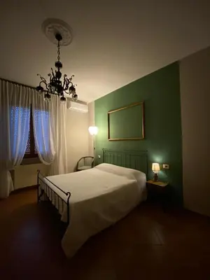 Letto o letti in una camera di Affittacamere B&B Caorso