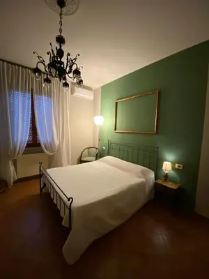 Letto o letti in una camera di Affittacamere B&B Caorso