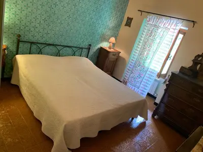 Letto o letti in una camera di StradaFacendo B&B