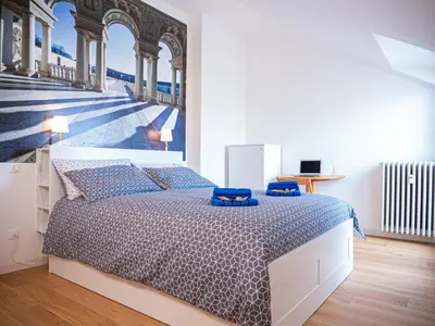 Letto o letti in una camera di Mansarda Le Torri