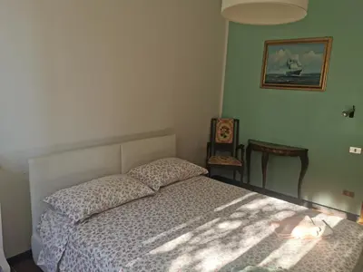 Letto o letti in una camera di WHITE & BLUE HOUSE