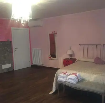 Letto o letti in una camera di B&B BuongiornoNotte