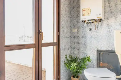 Bagno di GuestHost - Parma Parco Ducale Duplex Apartment with parking