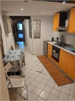 Cucina o angolo cottura di APPARTAMENTO CHECK iN