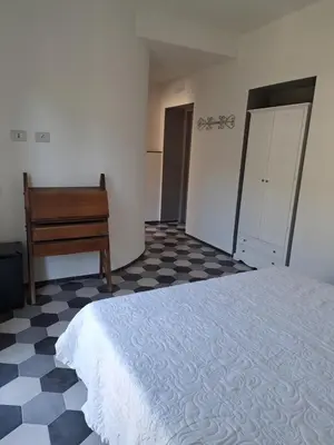 Letto o letti in una camera di PAVIAN