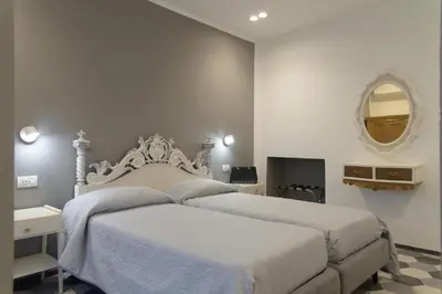 Letto o letti in una camera di PAVIAN