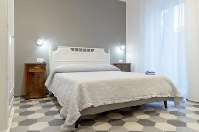 Letto o letti in una camera di PAVIAN