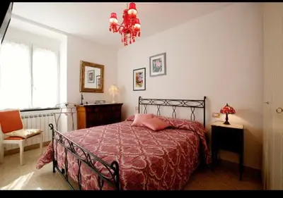 Letto o letti in una camera di Casa Gelsomino