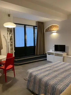 Letto o letti in una camera di La BonneBonne, Levanto