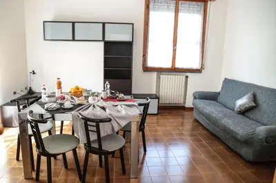 Area soggiorno di Guest House Via Emilia