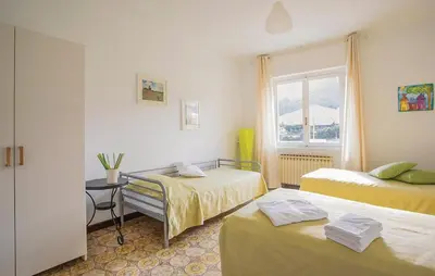 Letto o letti in una camera di La Quiete