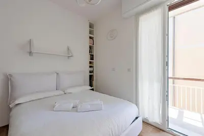 Letto o letti in una camera di JOIVY La casa di Rosetta