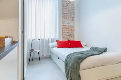 Letto o letti in una camera di VickyLù - City Center - by Host4U