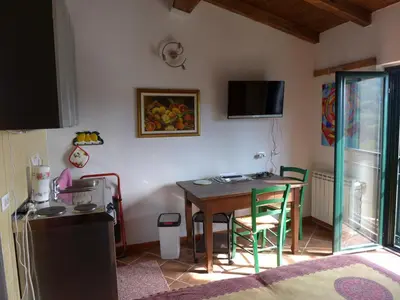 TV o dispositivi per l'intrattenimento presso Mini Appartement Colombana