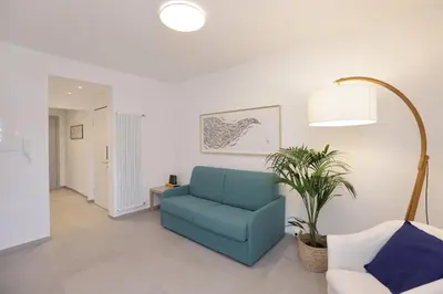 Area soggiorno di Adamaina - Sea view apartment with private garage