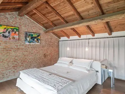 Letto o letti in una camera di Stagno Lombardo Garden Flat