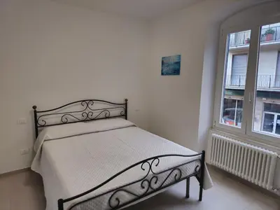 Letto o letti in una camera di Casa Anelita