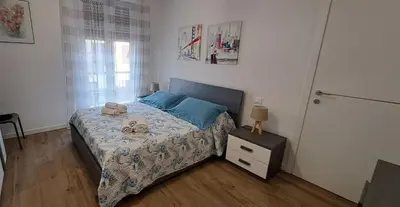 Letto o letti in una camera di Appartamento Albachiara