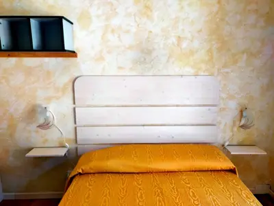 Letto o letti in una camera di Molo Giano