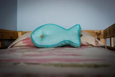 Letto o letti in una camera di B&B LA MIMOSA E IL GELSOMINO